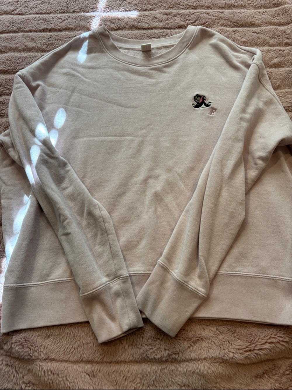 Figaro from Disneys Pinnochio pink crew neck (size M)